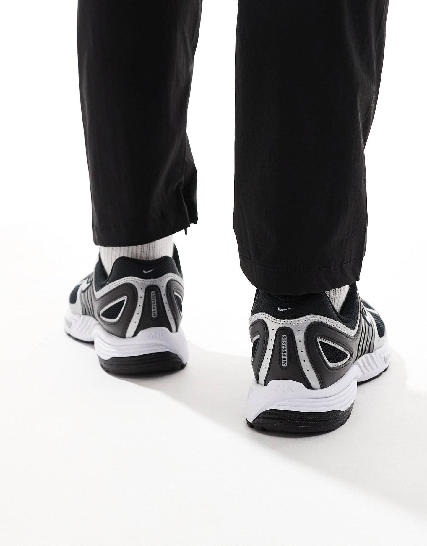 Nike Pegasus 2005 trainers in black and metallic silver