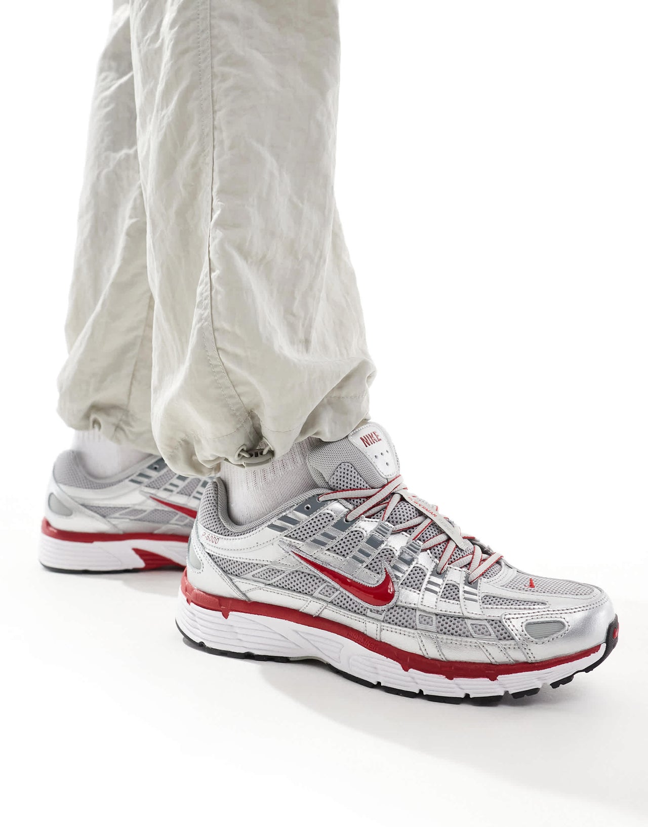 Nike P-6000 unisex trainers in metallic silver and red