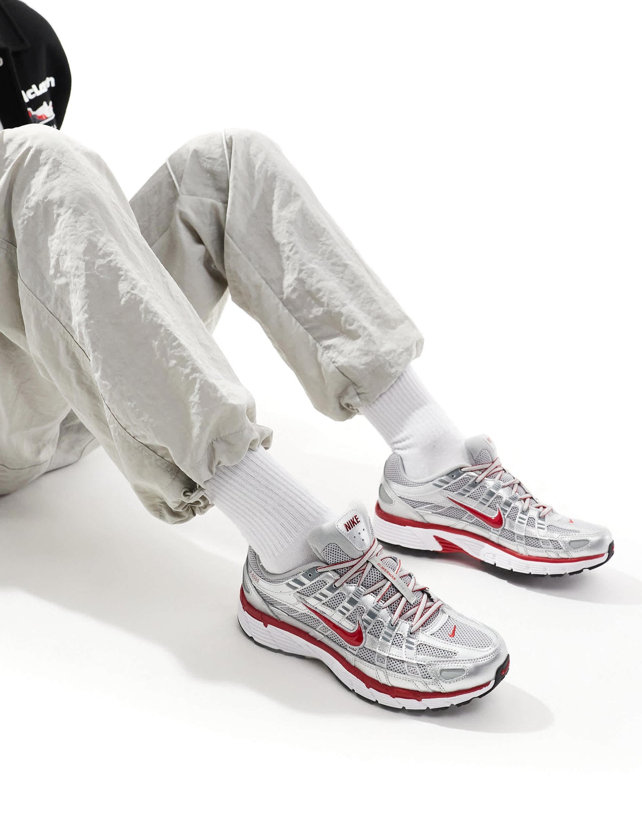 Nike P-6000 unisex trainers in metallic silver and red