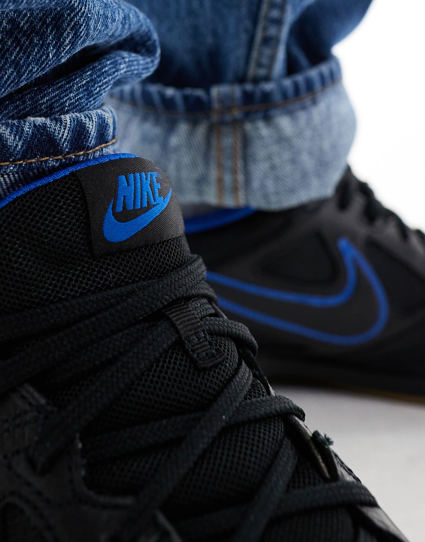 Nike Gato trainers in black and blue