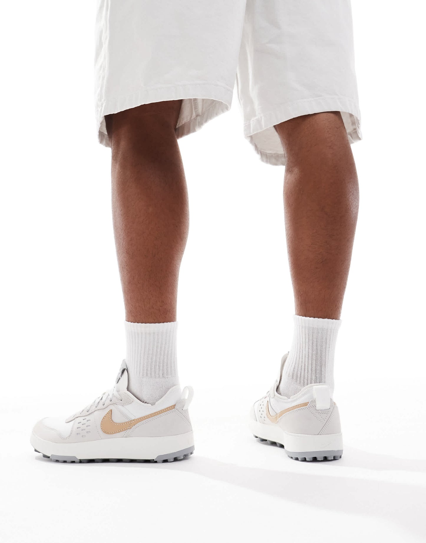 Nike C1ty trainers in beige and grey