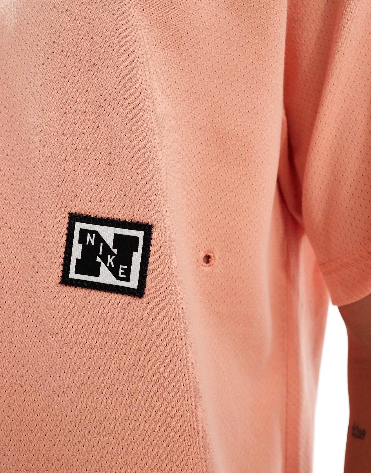 Nike Training Heritage Dri-FIT t-shirt in orange