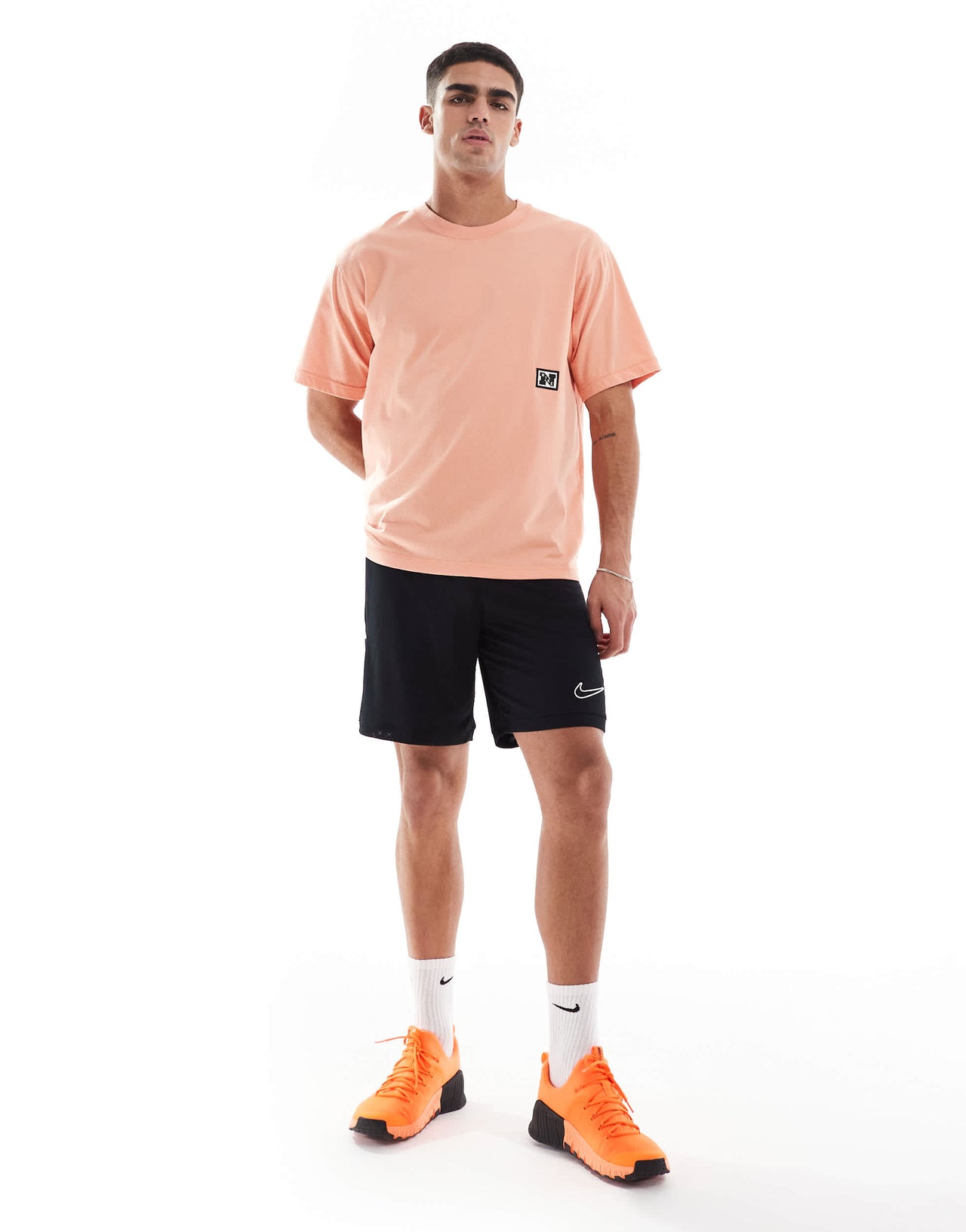 Nike Training Heritage Dri-FIT t-shirt in orange