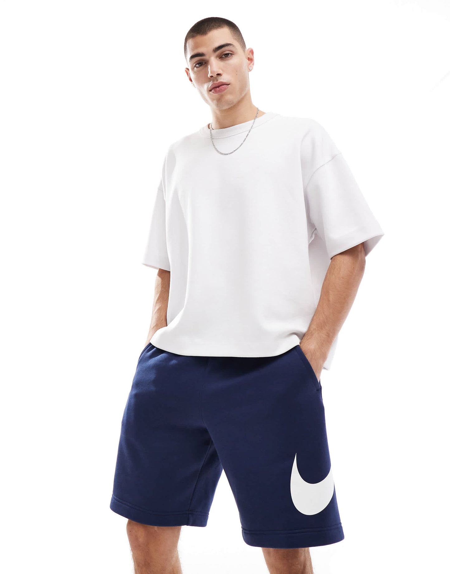 Nike Club shorts with large logo graphic in navy