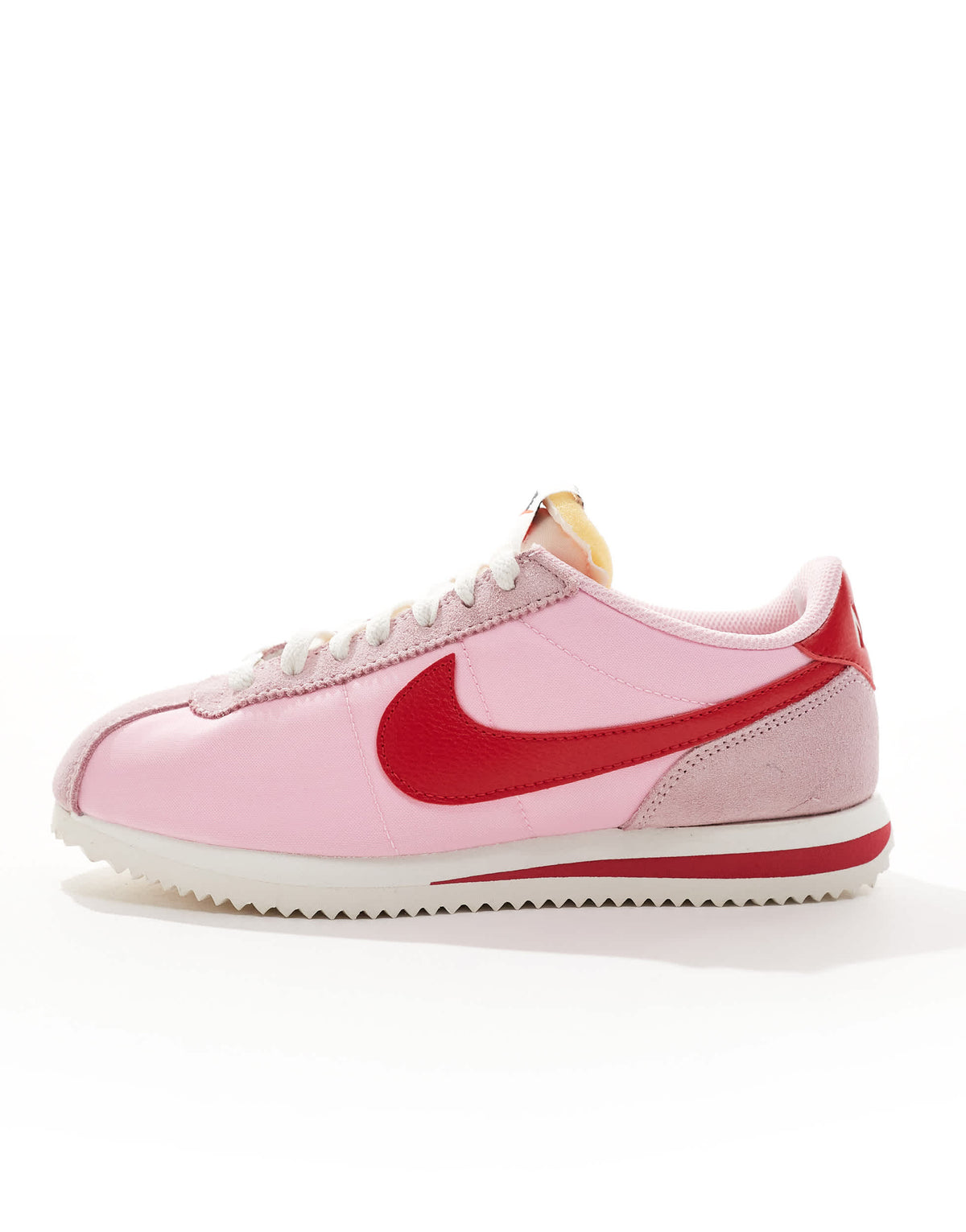 Nike Cortez TXT trainers in pink and red
