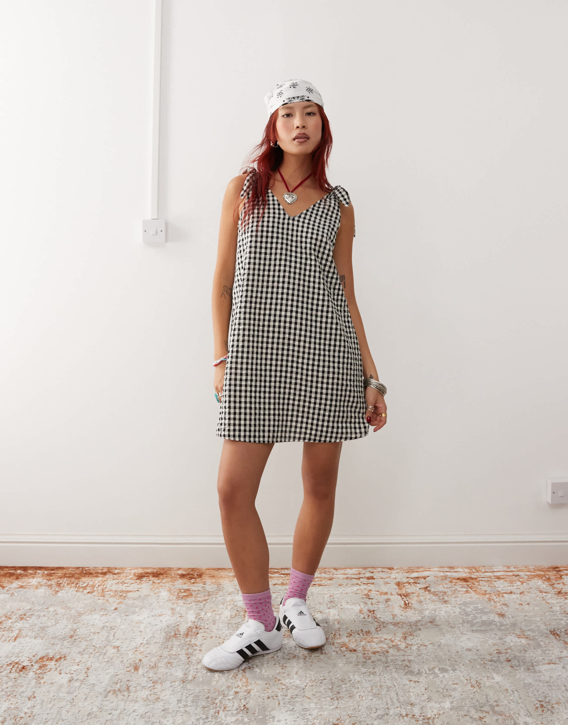 Monki seersucker bow tie strap mini dress in black and white gingham