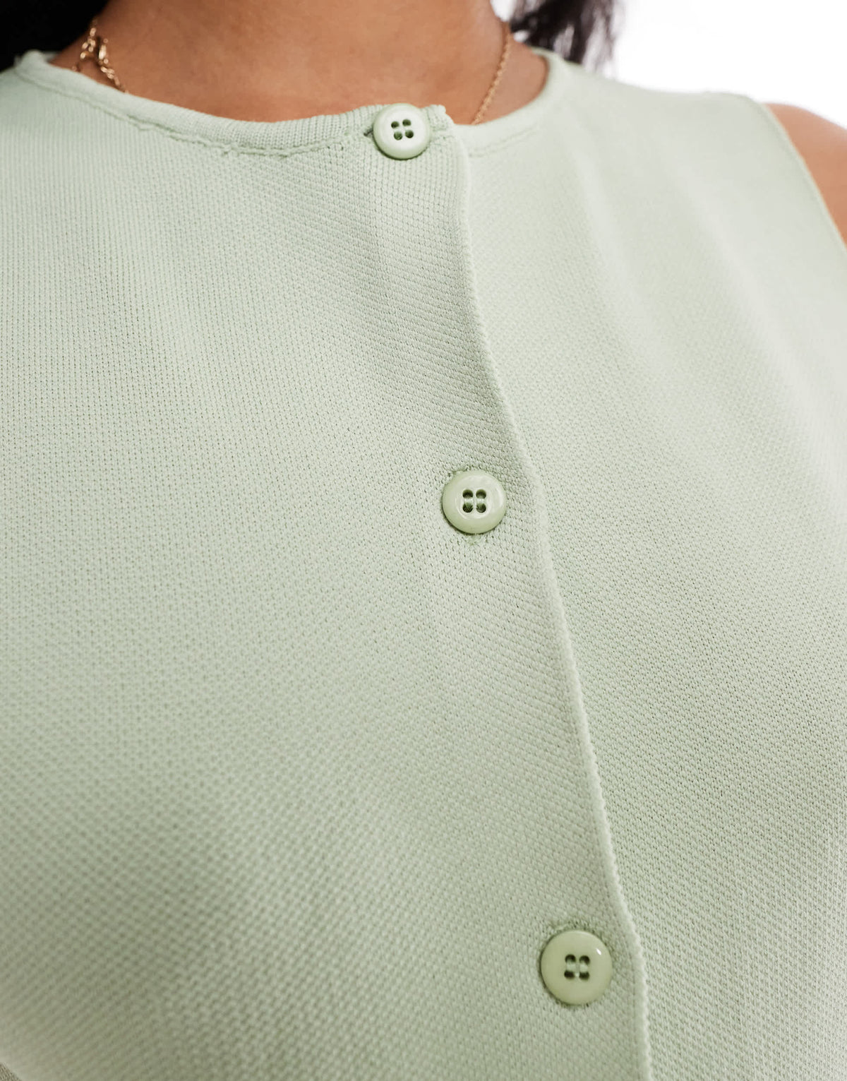 ASOS DESIGN knitted crew neck waistcoat with front split in pistachio