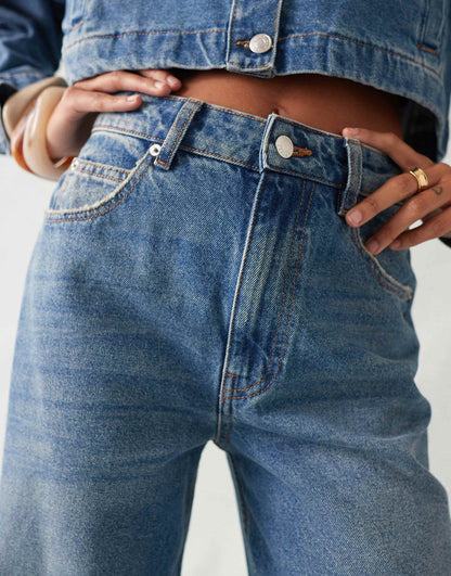 ASOS DESIGN wide leg jean with deep hem in mid blue