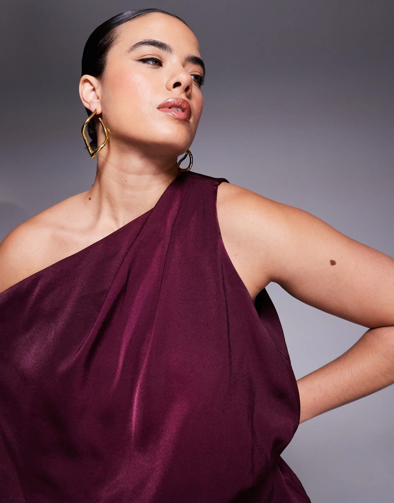 ASOS DESIGN Curve satin fallen shoulder midi dress with wrap skirt in burgundy