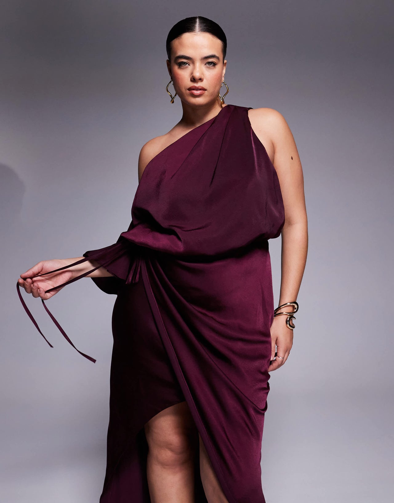 ASOS DESIGN Curve satin fallen shoulder midi dress with wrap skirt in burgundy