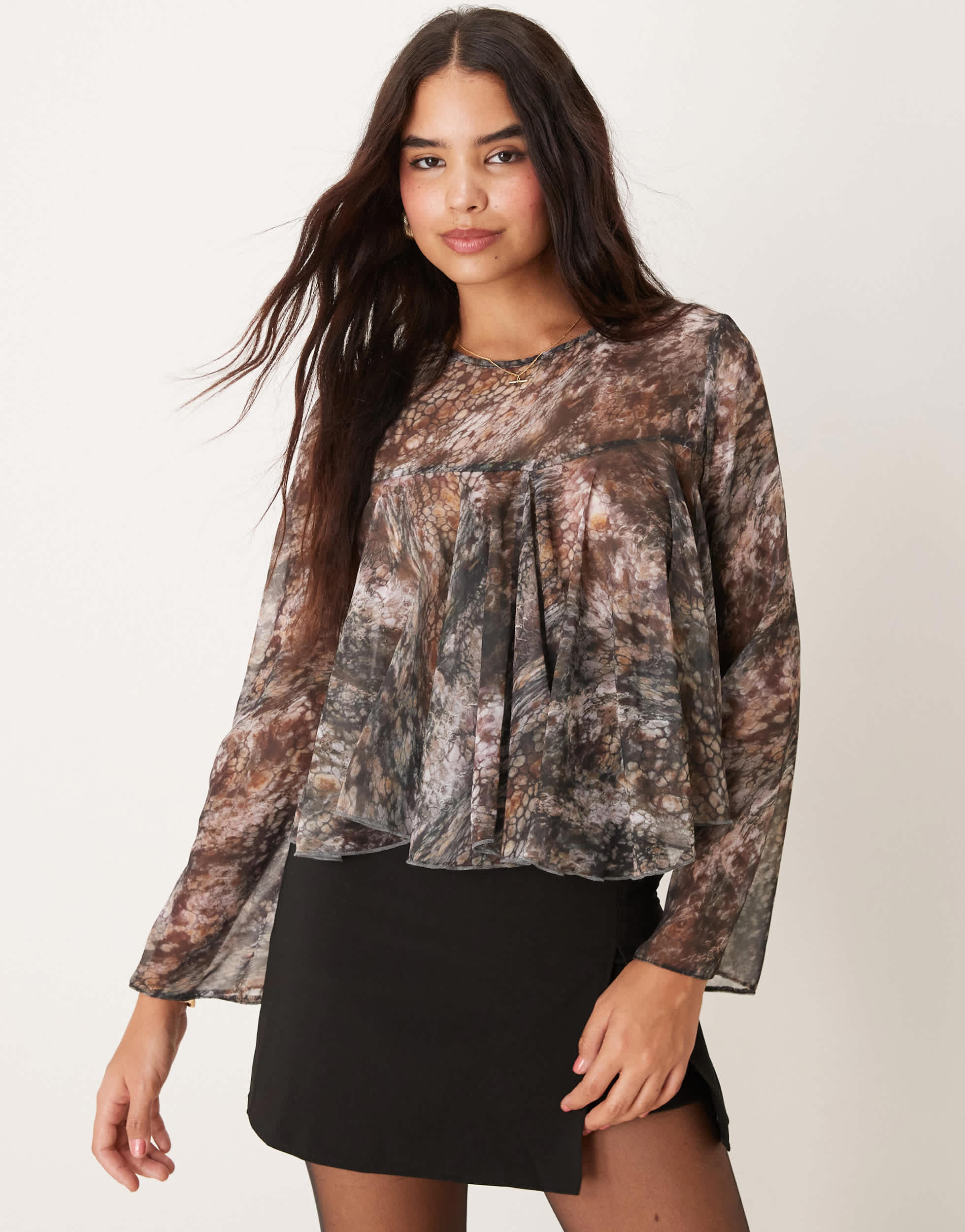 ASOS DESIGN long sleeve godet top in blurred abstract print