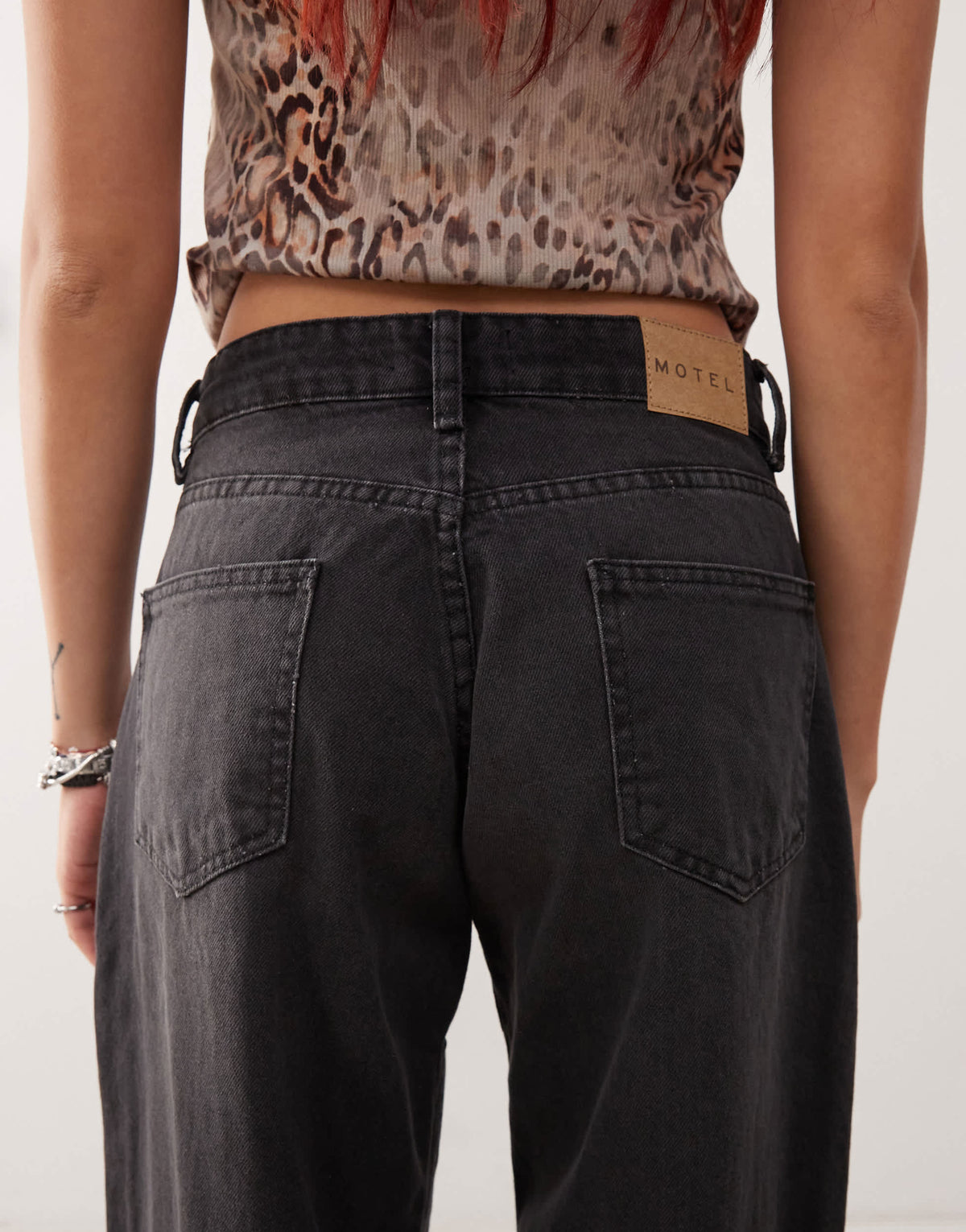 Motel roomy wide leg low rise jeans in washed black