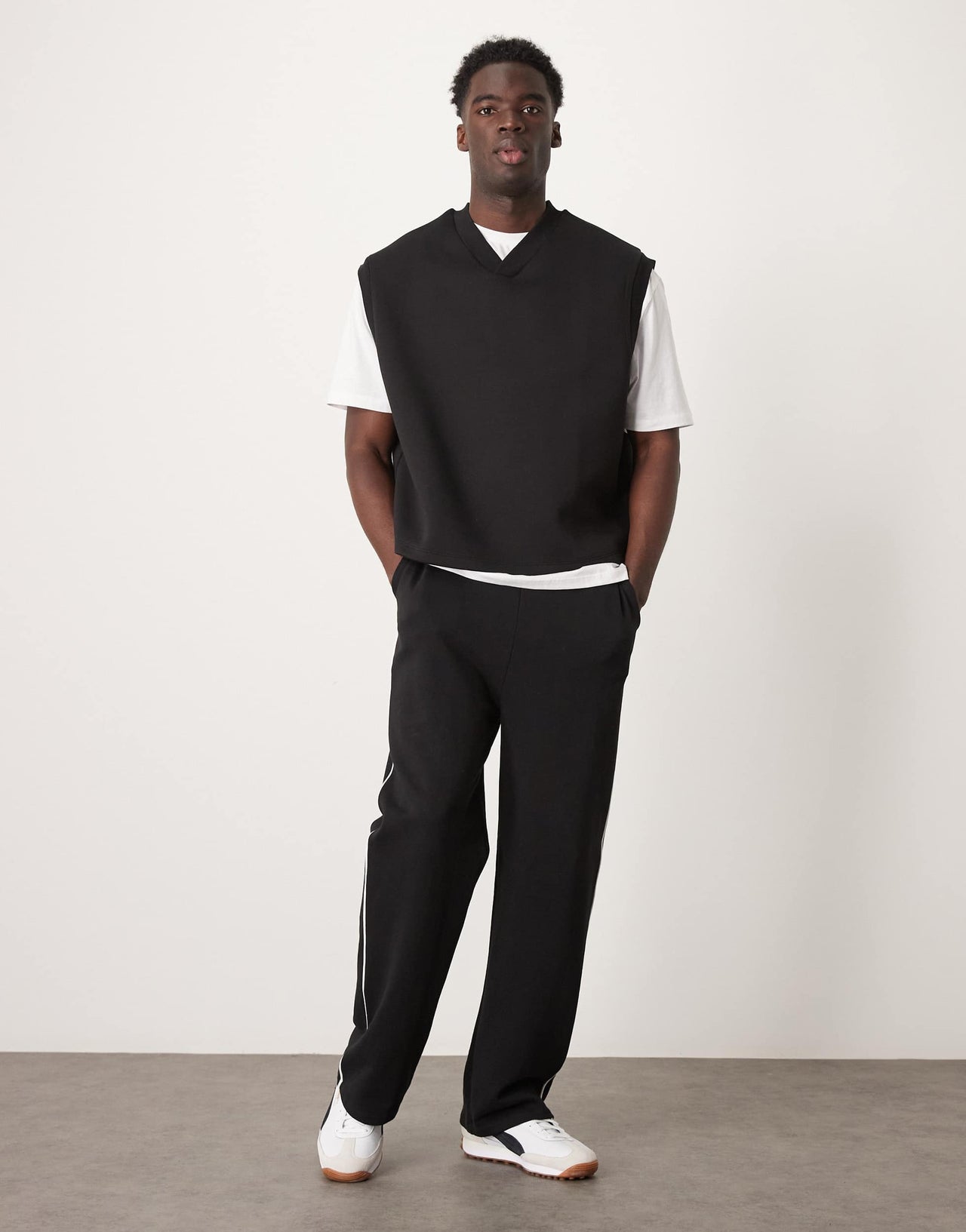 ASOS DESIGN relaxed v-neck tank top in scuba-style fabric in black