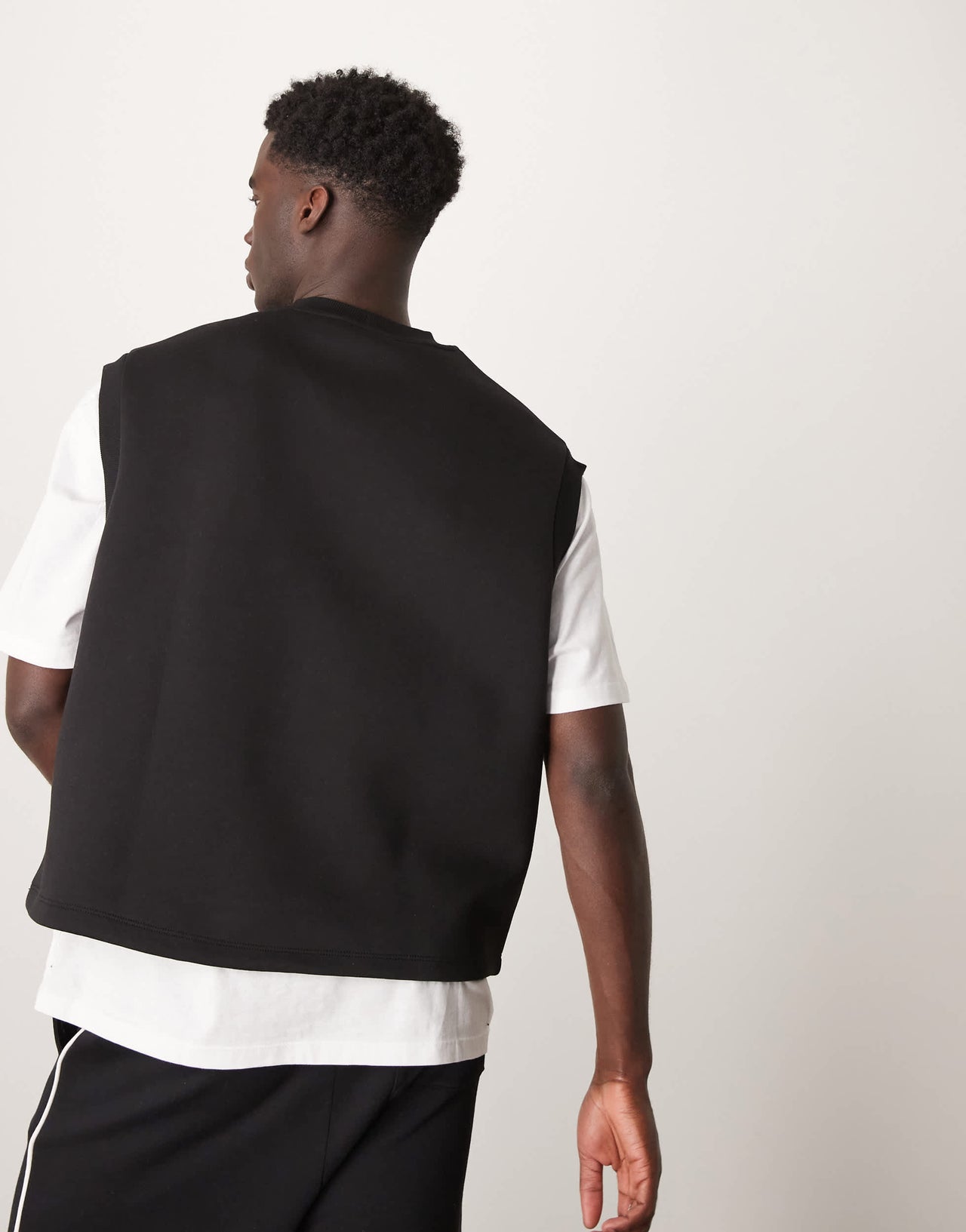 ASOS DESIGN relaxed v-neck tank top in scuba-style fabric in black