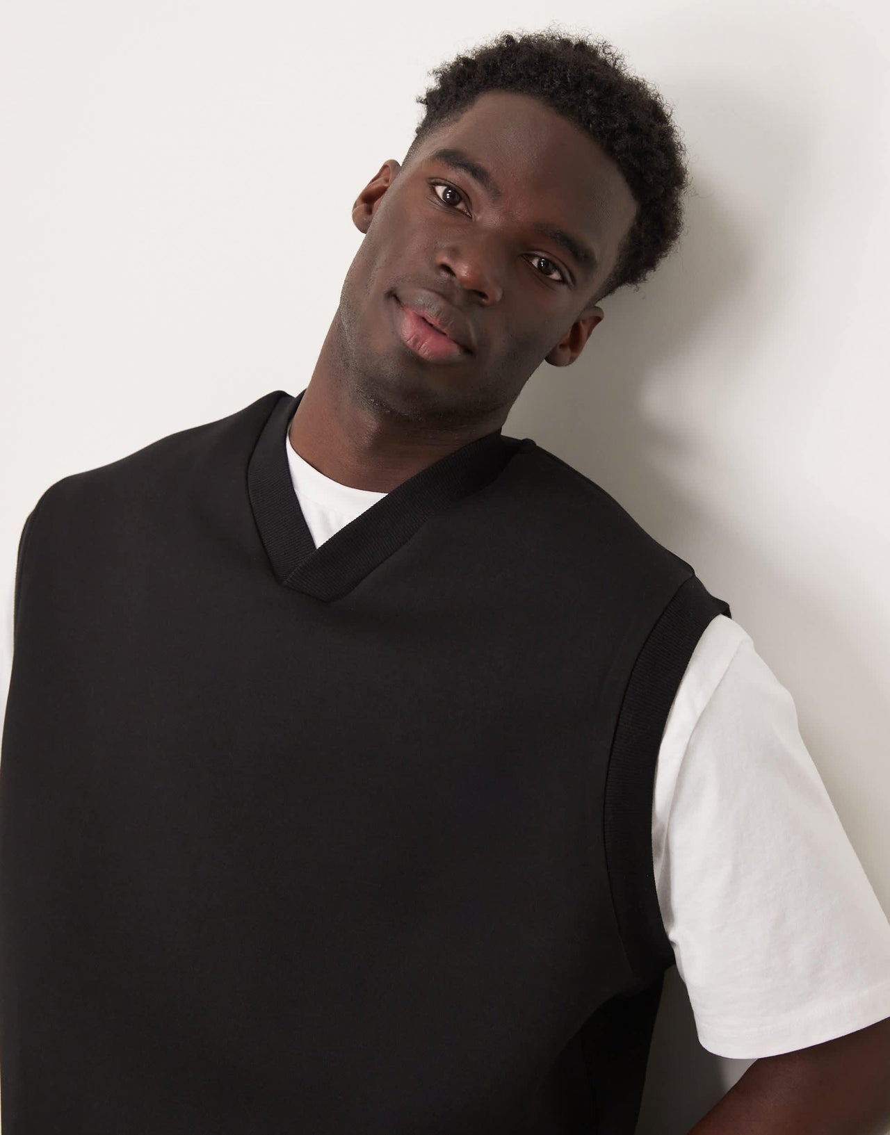 ASOS DESIGN relaxed v-neck tank top in scuba-style fabric in black