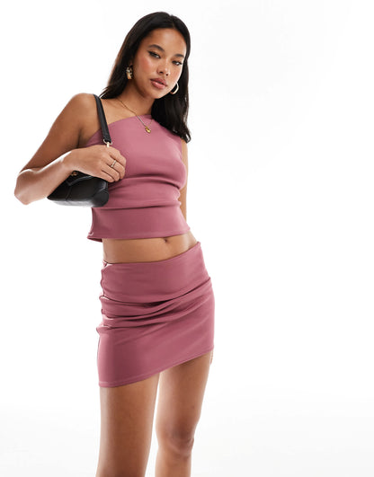 ASOS DESIGN co-ord tuck detail mini skirt in deep rose in scuba-style fabric