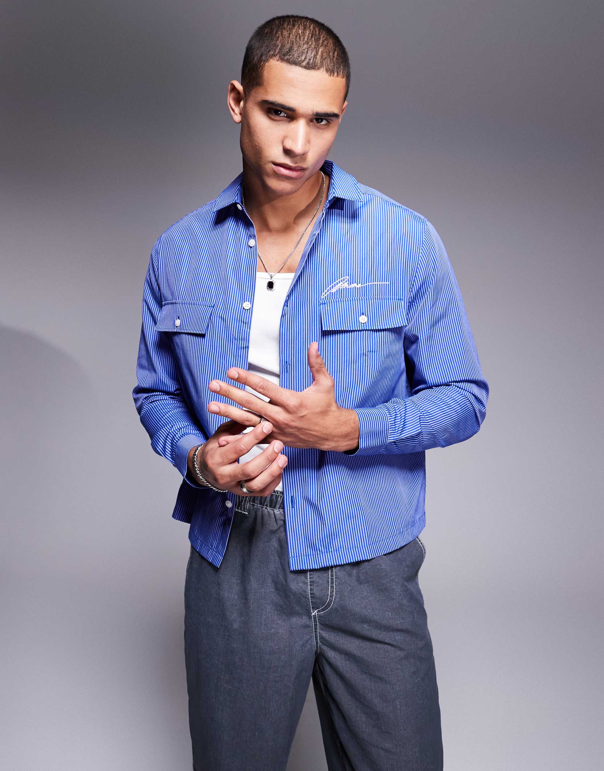 ASOS DESIGN boxy relaxed stripe shirt with chest embroidery in blue