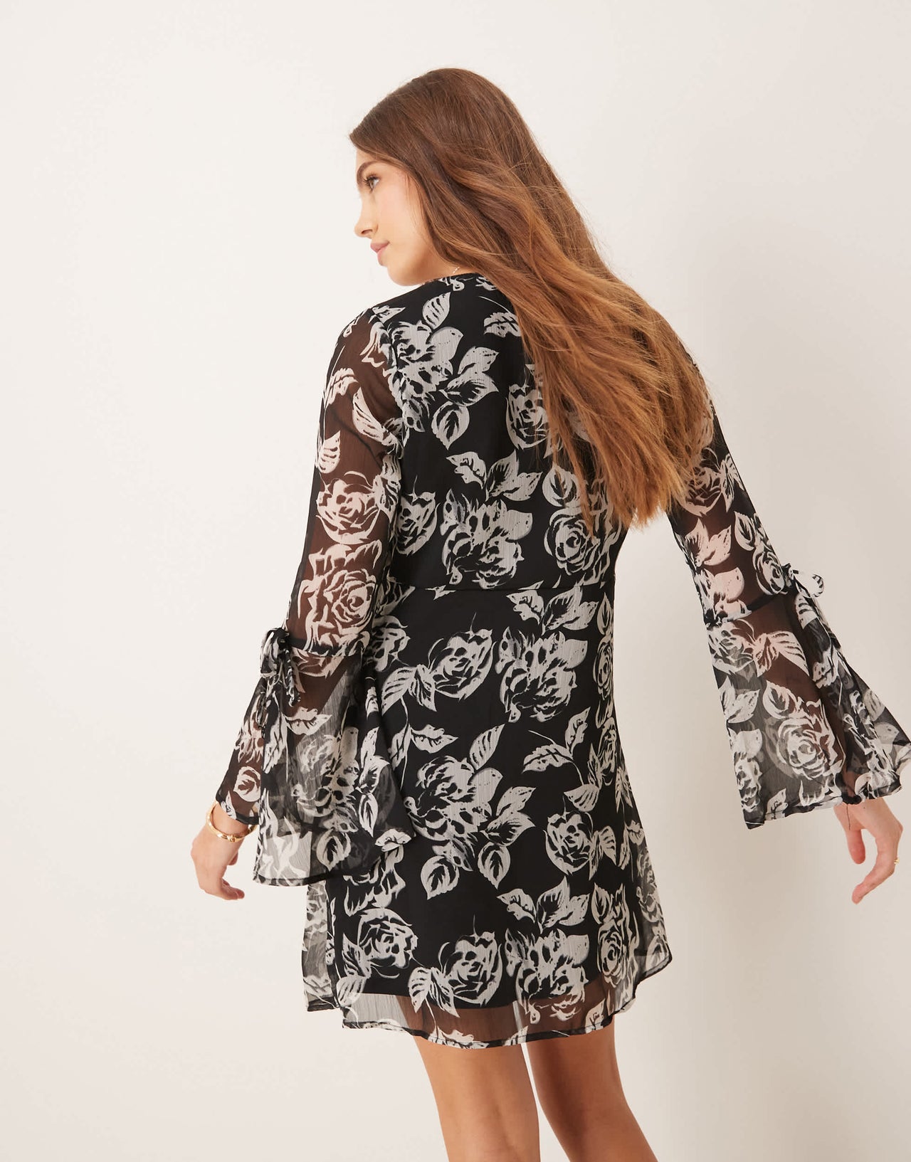 New Look chiffon flare sleeve mini dress in black pattern