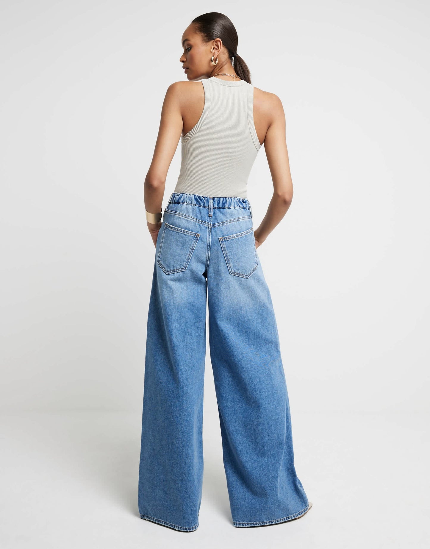 River Island Mid rise elastic back palazzo jeans in denim - medium