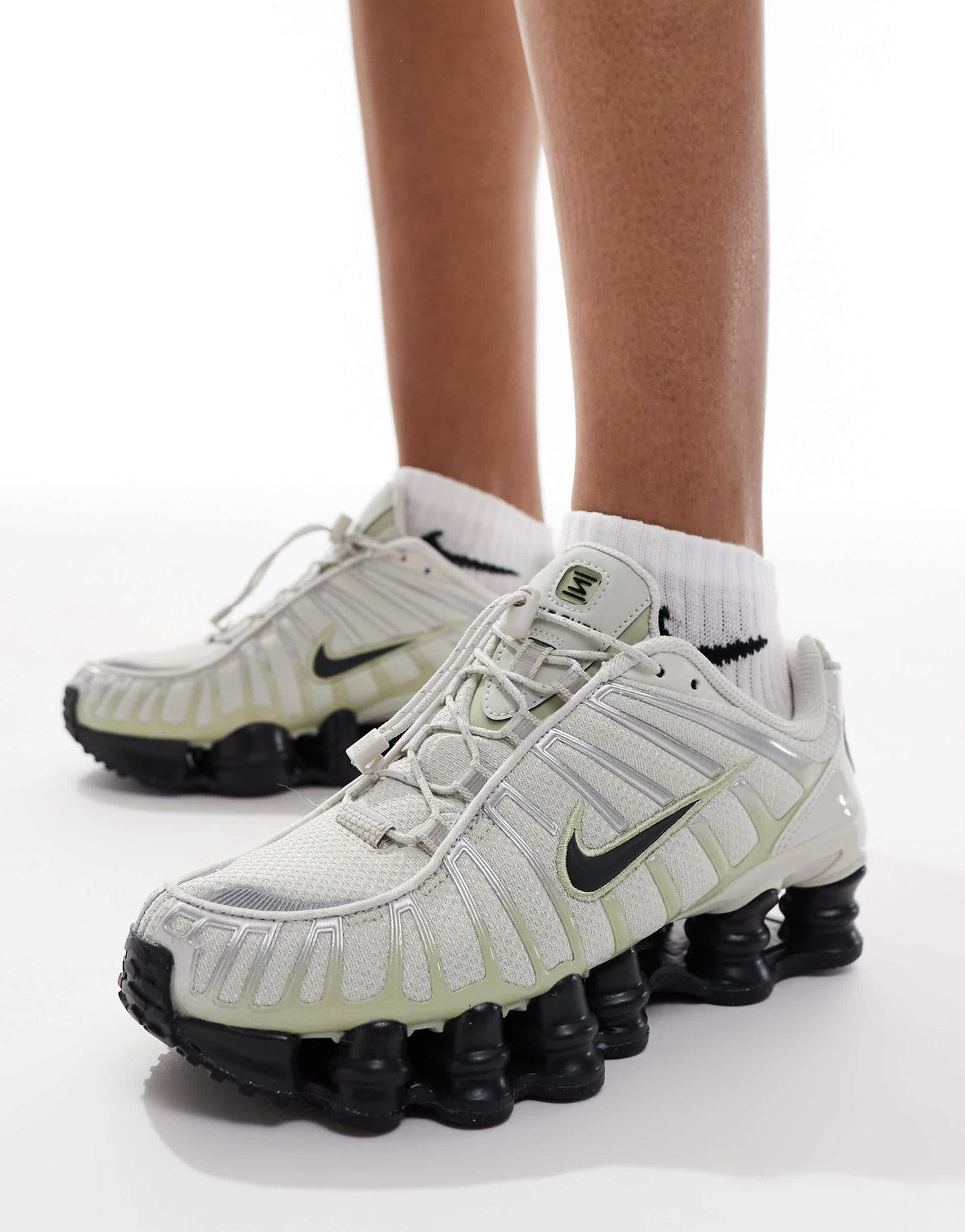 Nike Shox TL trainers in off-white and black