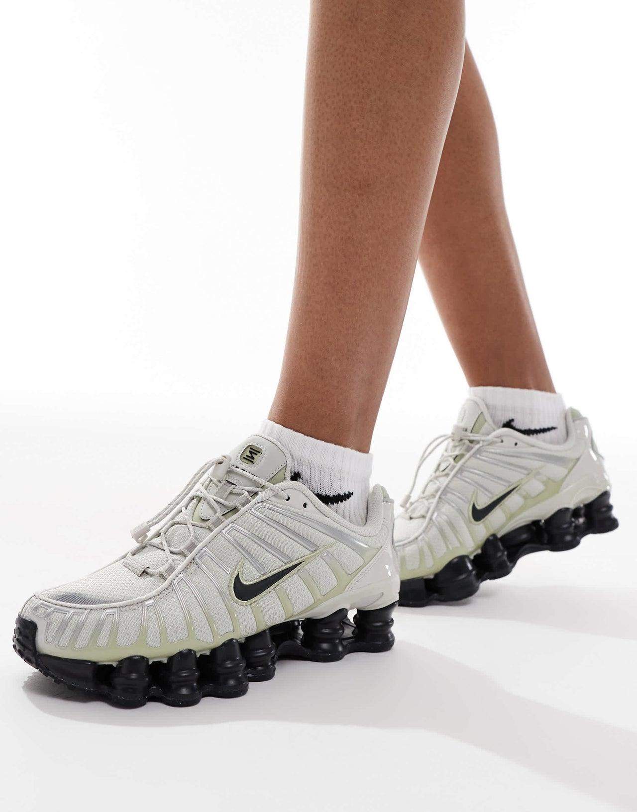 Nike Shox TL trainers in off-white and black
