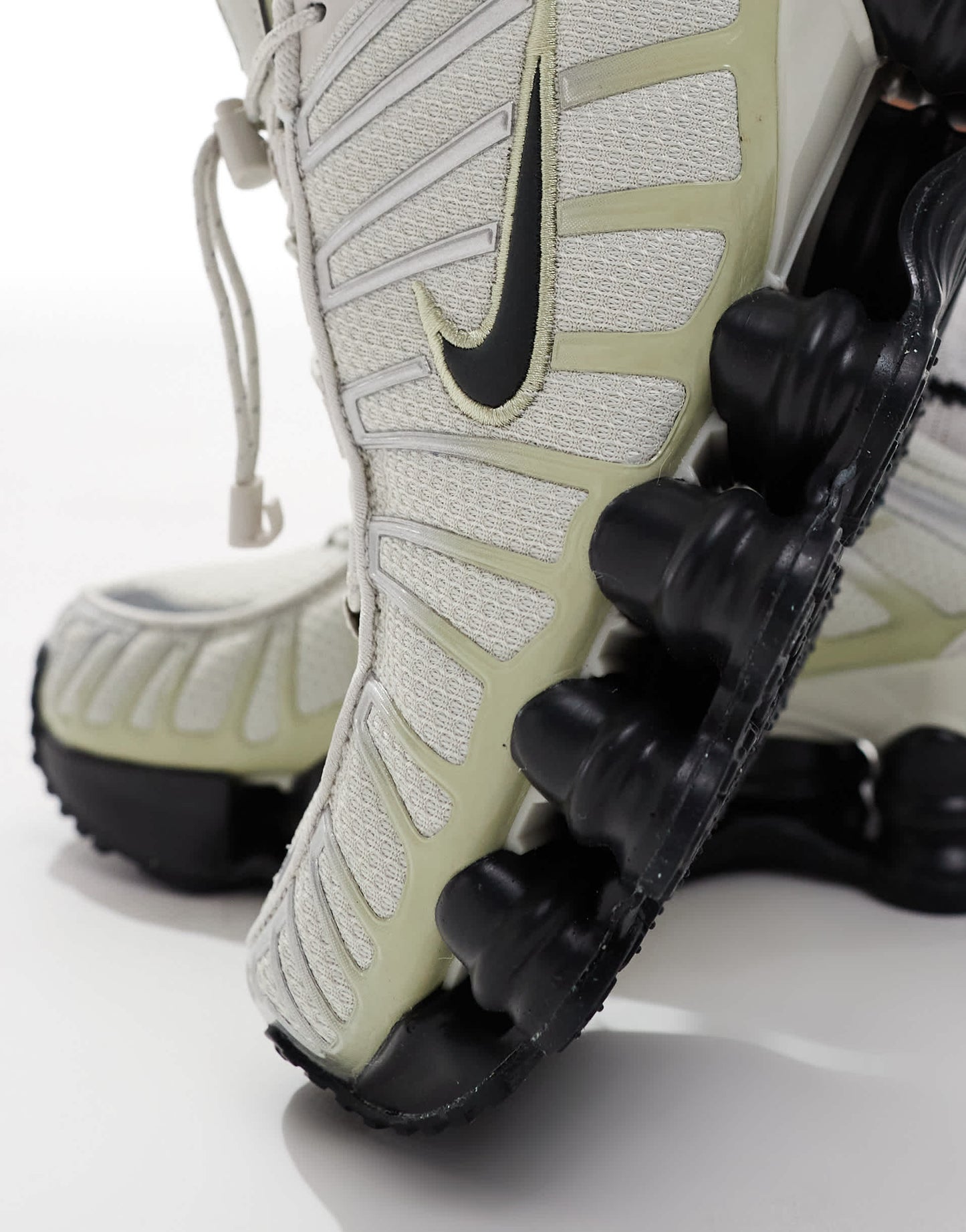 Nike Shox TL trainers in off-white and black