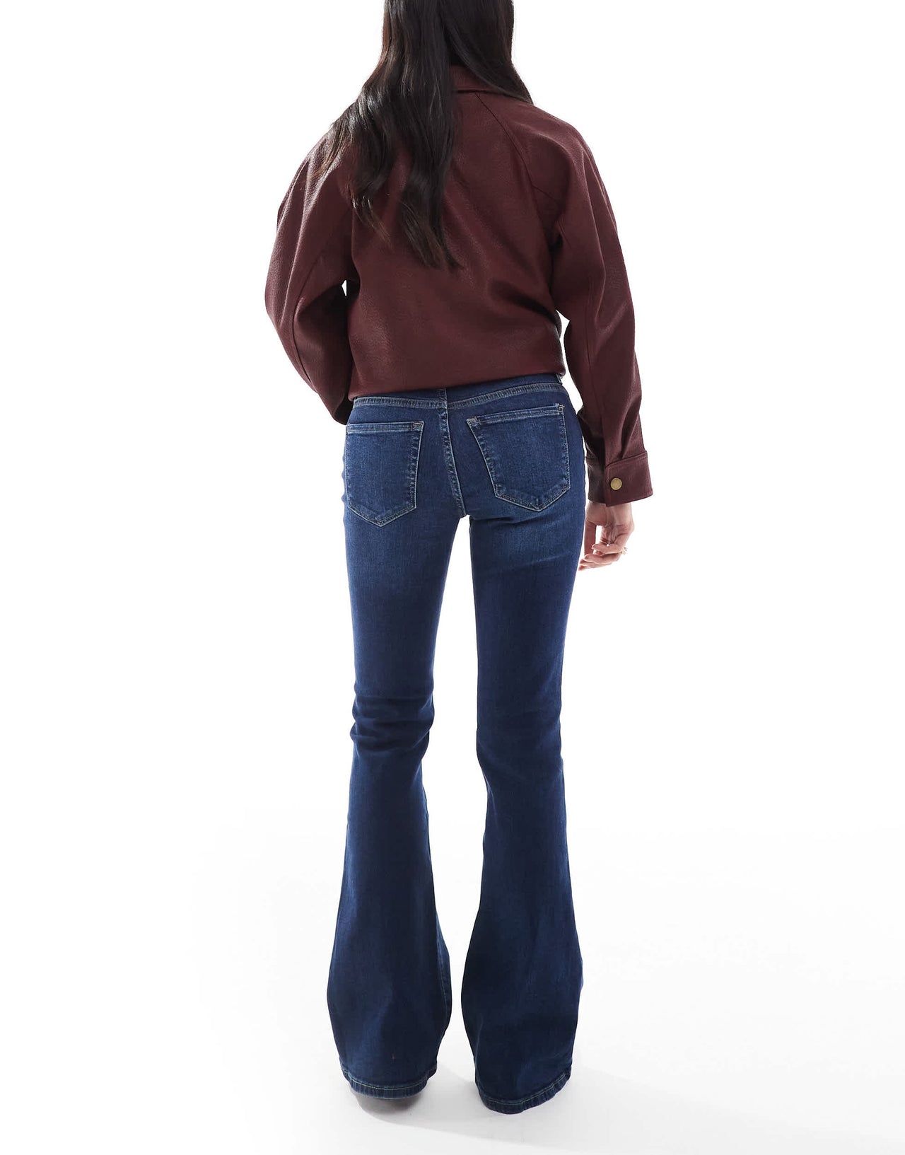 Bershka Petite high waisted flared jeans in dark wash