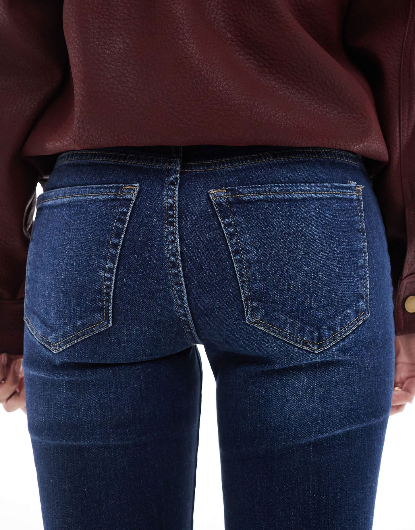 Bershka Petite high waisted flared jeans in dark wash