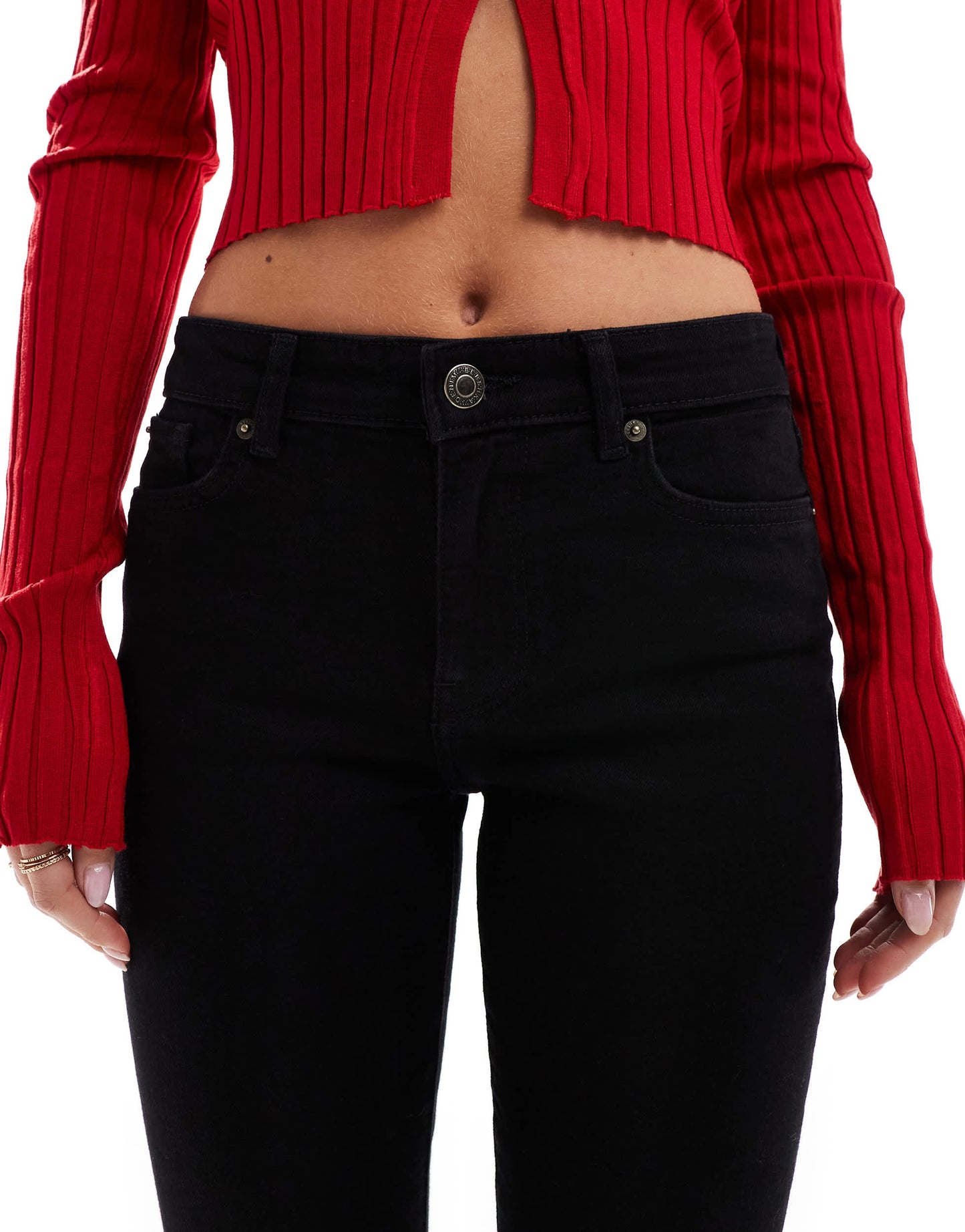 Bershka Petite high waisted flared jeans in black