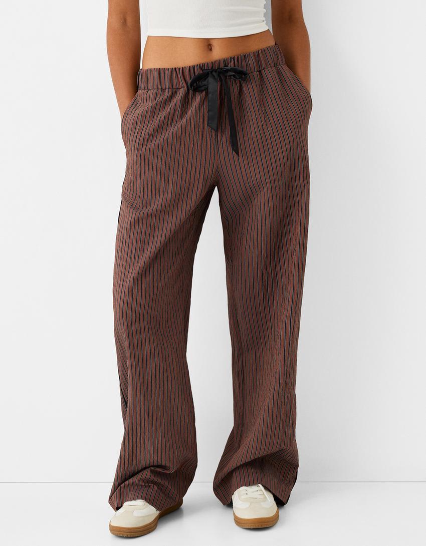 Bershka ribbon drawstring waist wide leg trousers in brown & stripe