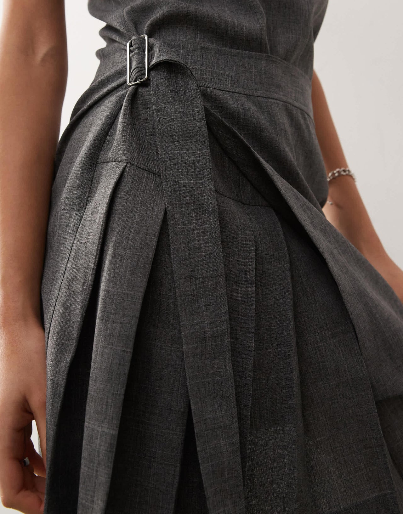 COLLUSION kilted mini pini dress with buckle detail in grey