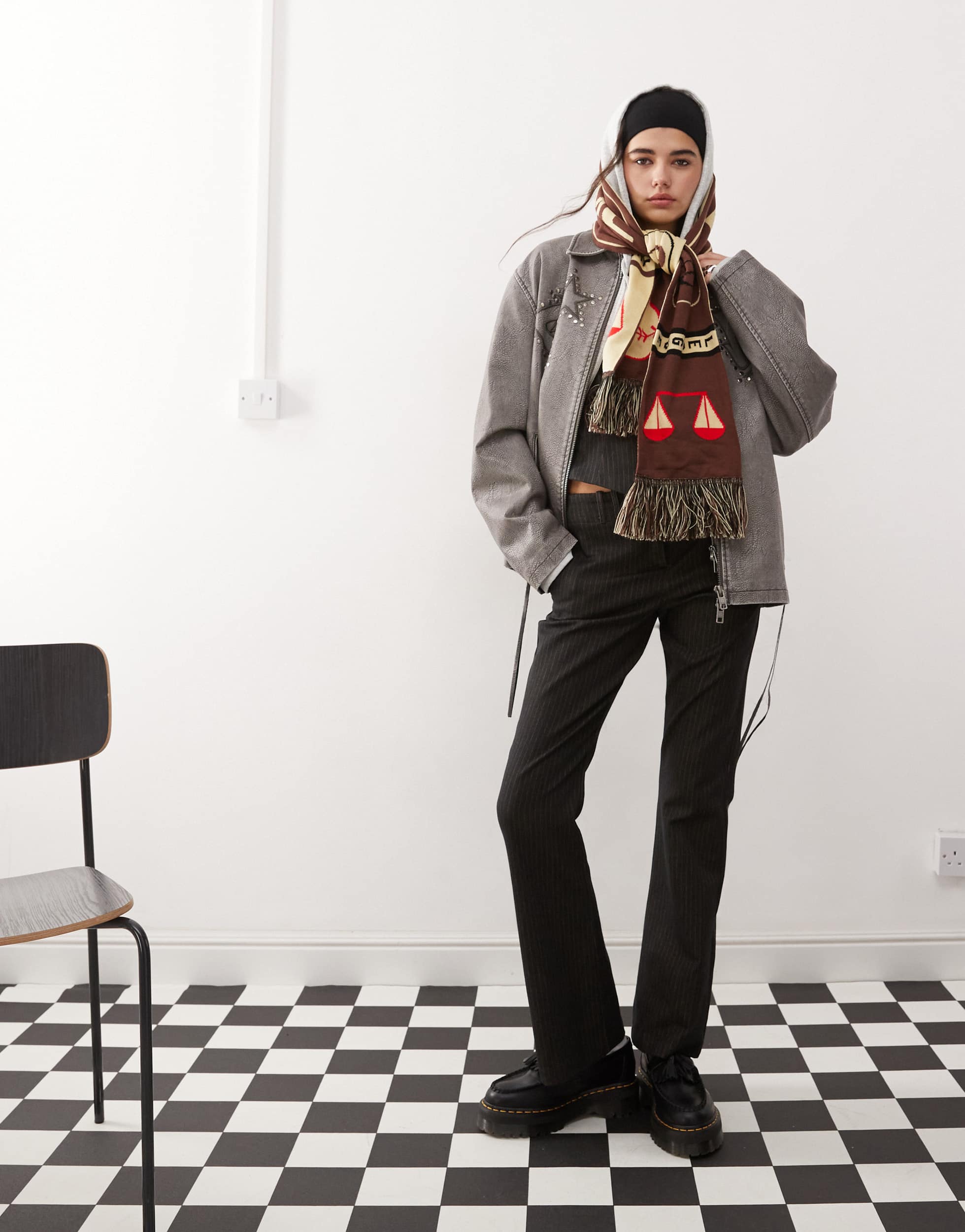 COLLUSION low rise pinstripe kick flare trousers in black