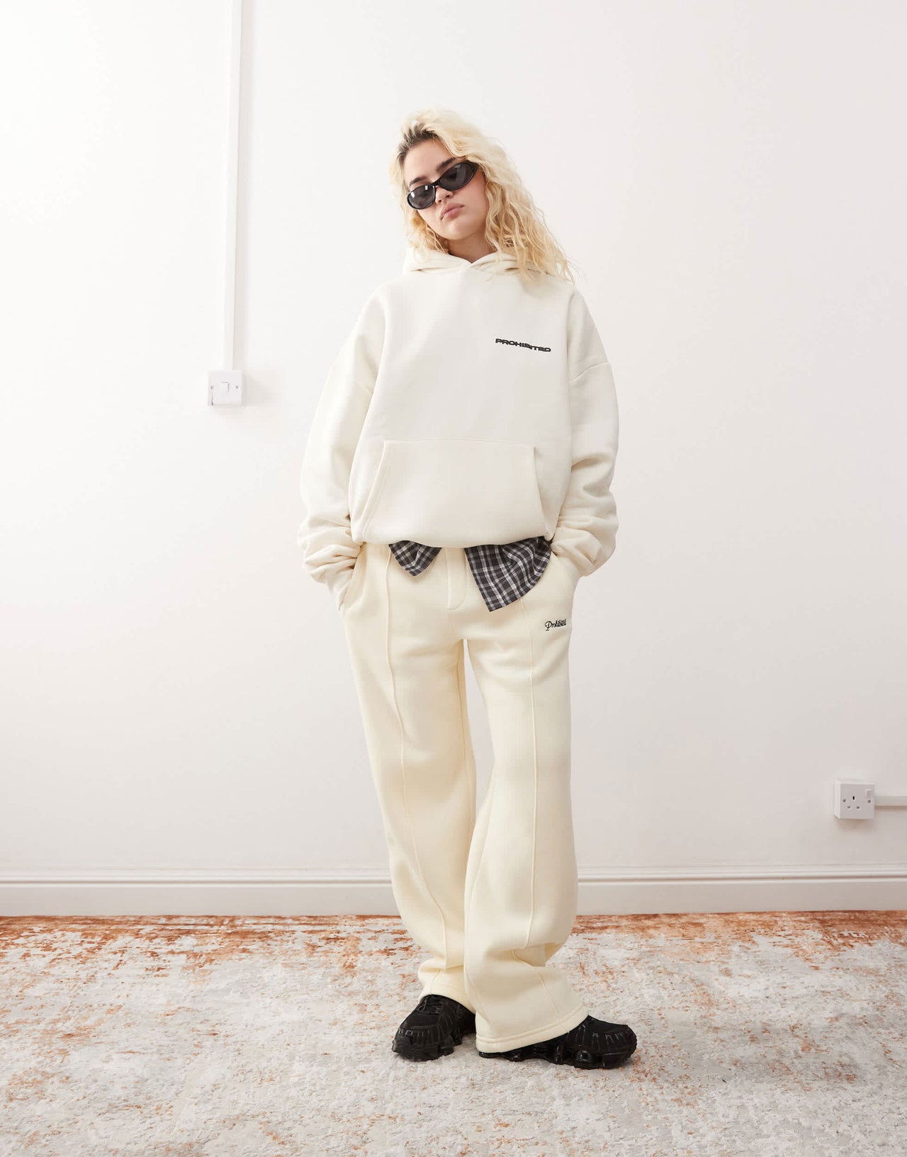 Prohibited script logo straight leg joggers in cream