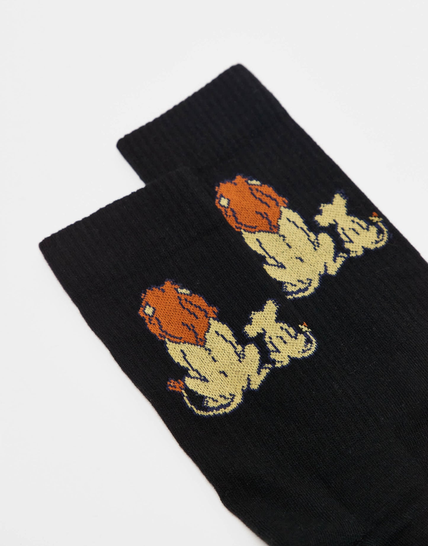 ASOS DESIGN Disney Lion King sock in black