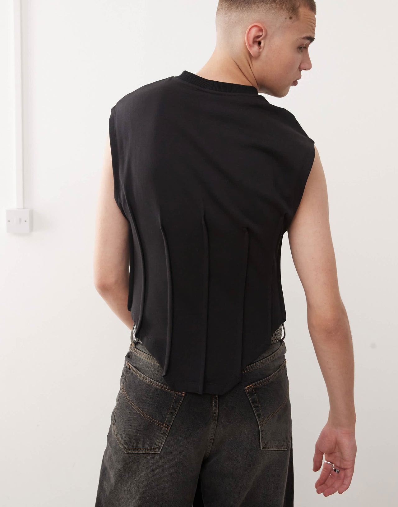 COLLUSION Corset shrunken black sweat tank with metal branding in black