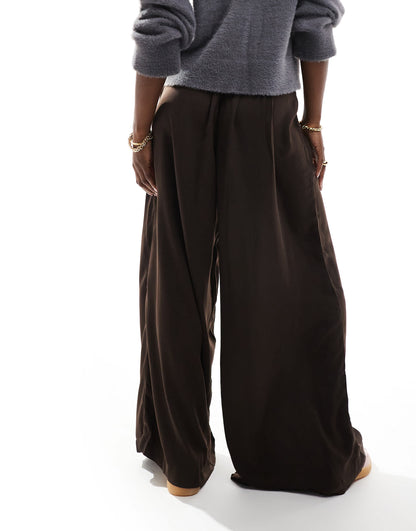 AWARE wide leg pleat front trousers in chocolate brown