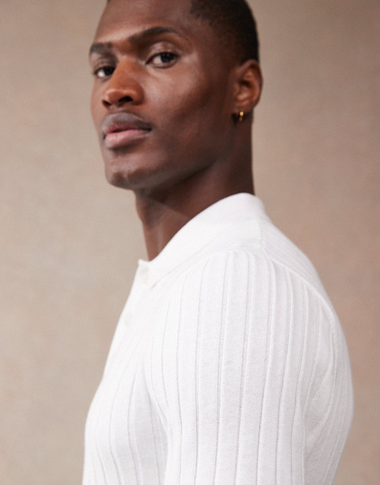 ASOS DESIGN muscle fit knitted rib polo t-shirt in white