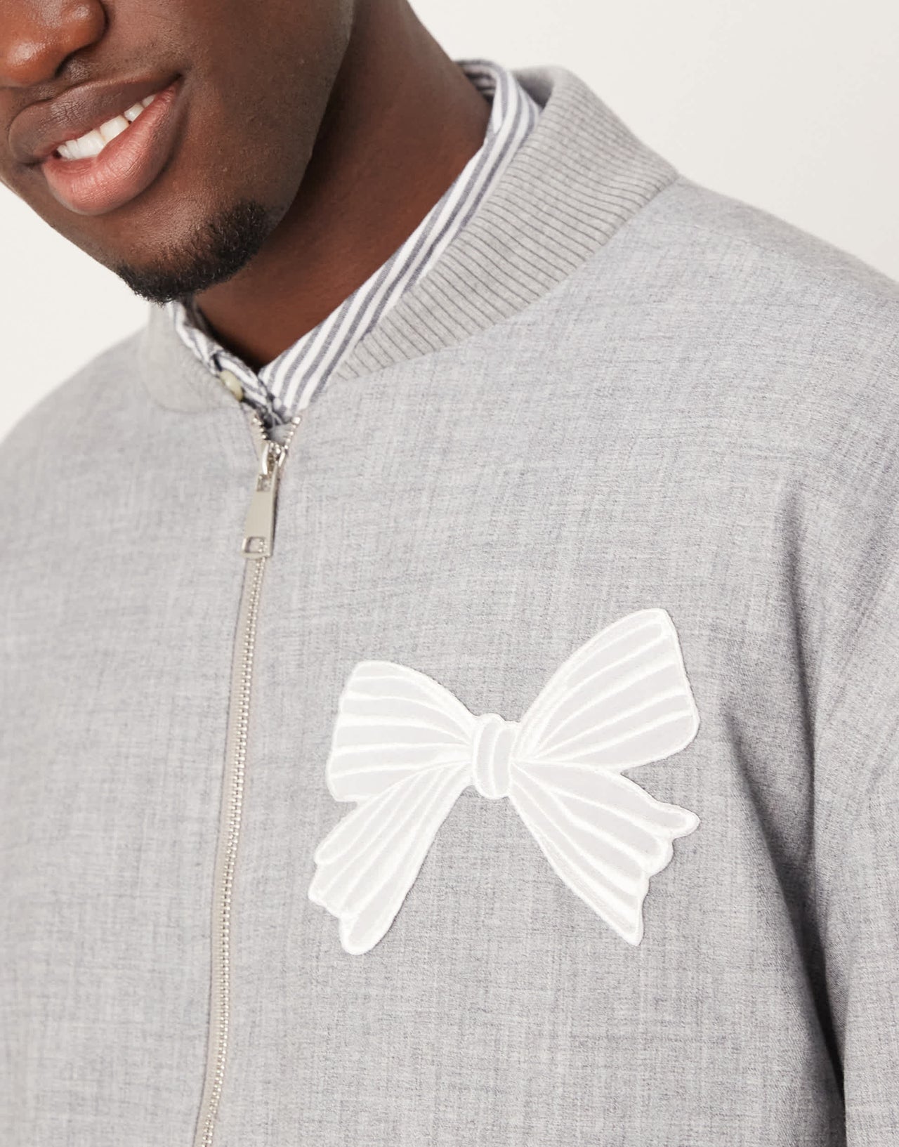 Sister Janeunisex bow embroidered bomber jacket in grey