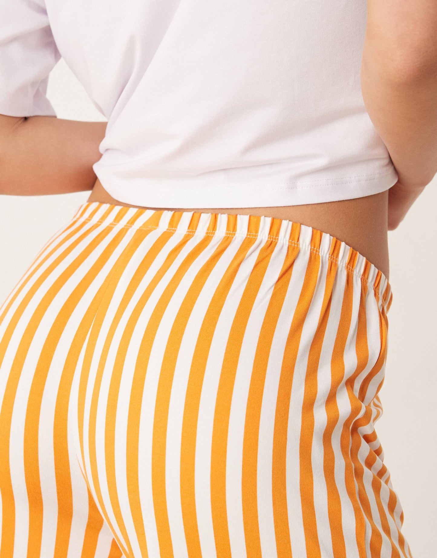 Urban Threads co-ord trousers with orange stripe print