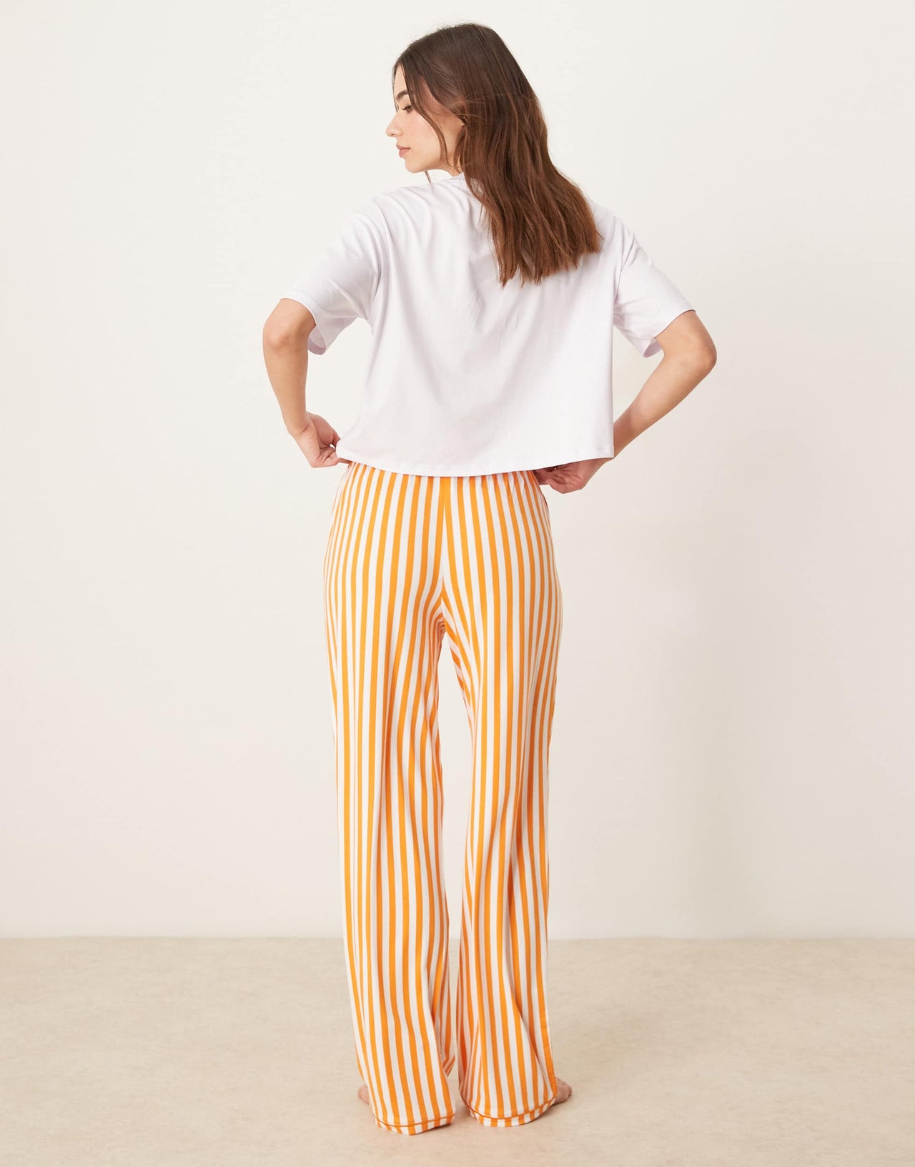 Urban Threads co-ord trousers with orange stripe print