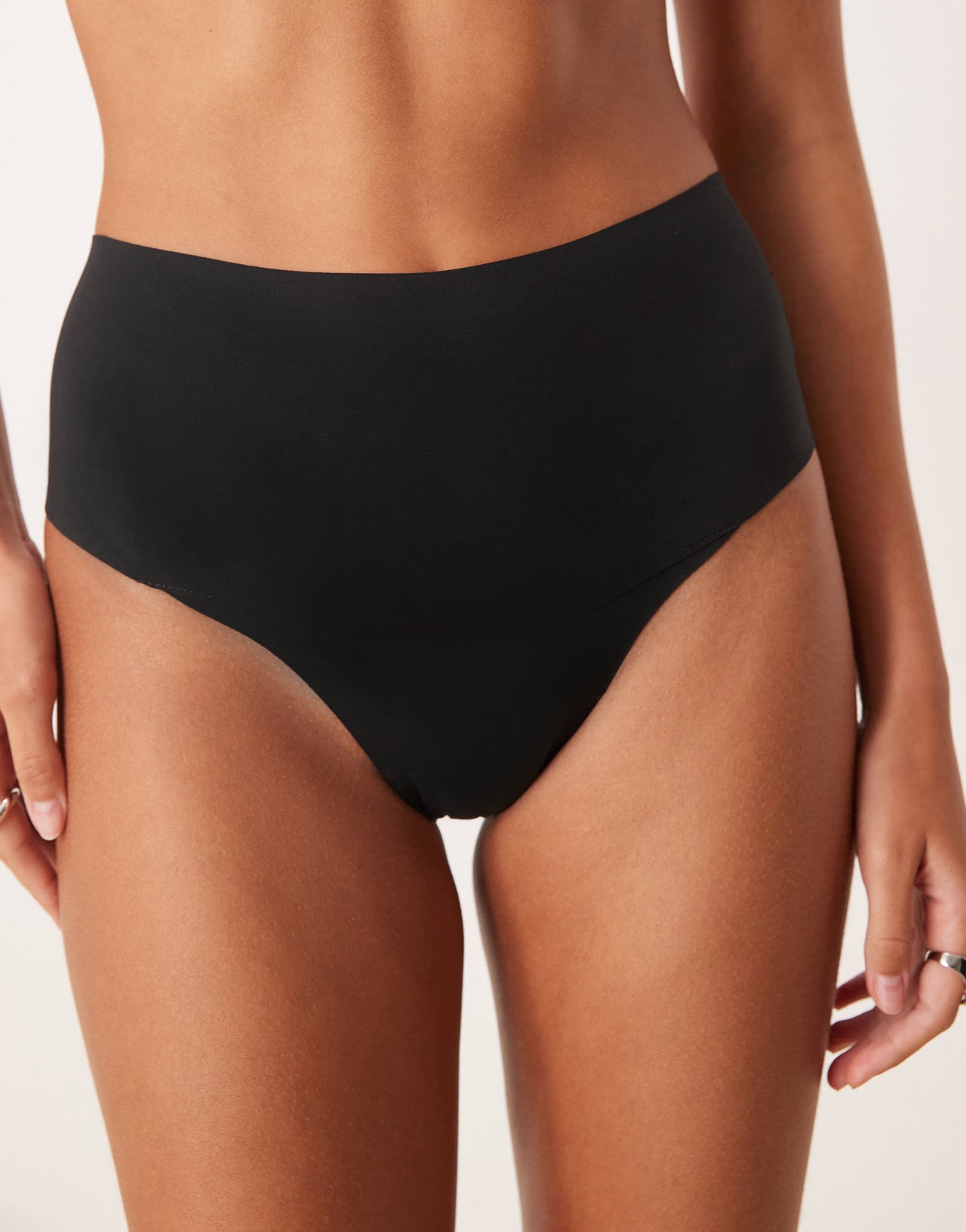 SPANXsupersmooth Undietectable tanga brief in black