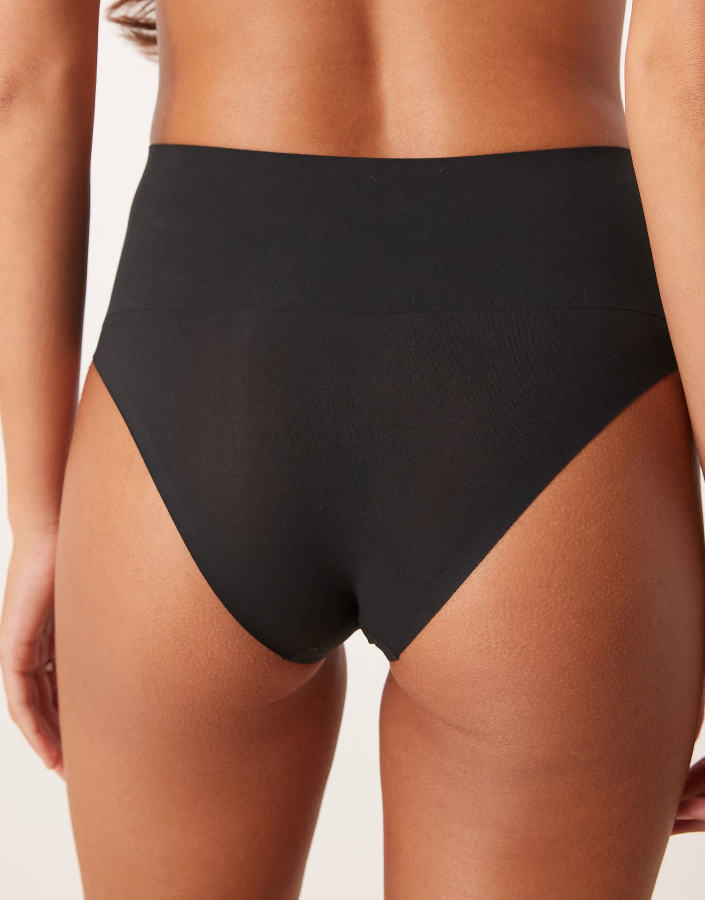 SPANXsupersmooth Undietectable tanga brief in black