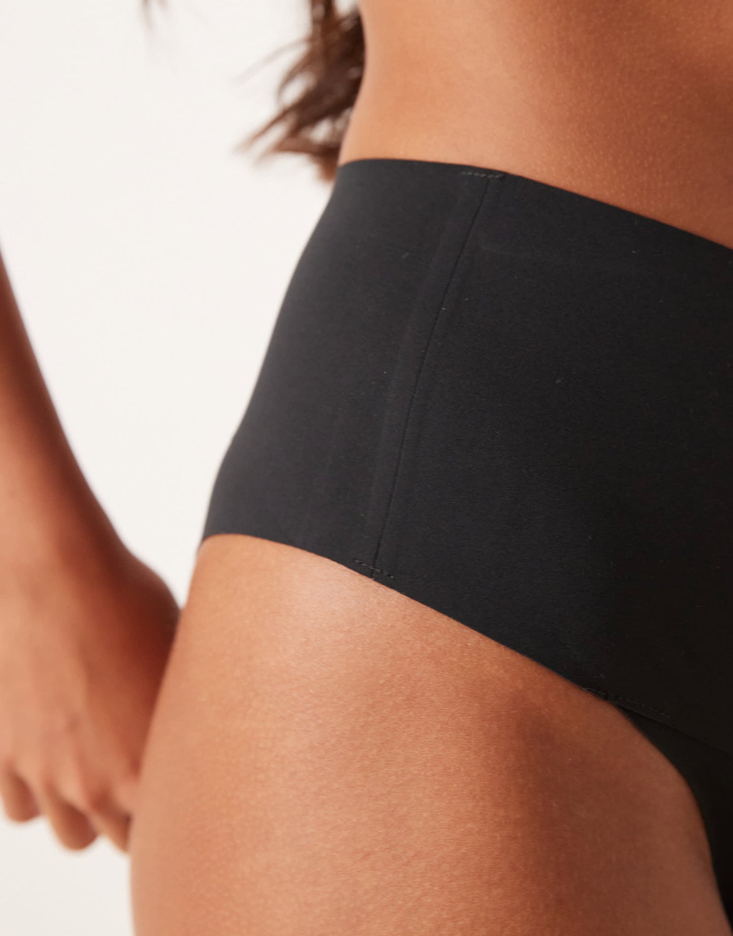 SPANXsupersmooth Undietectable tanga brief in black