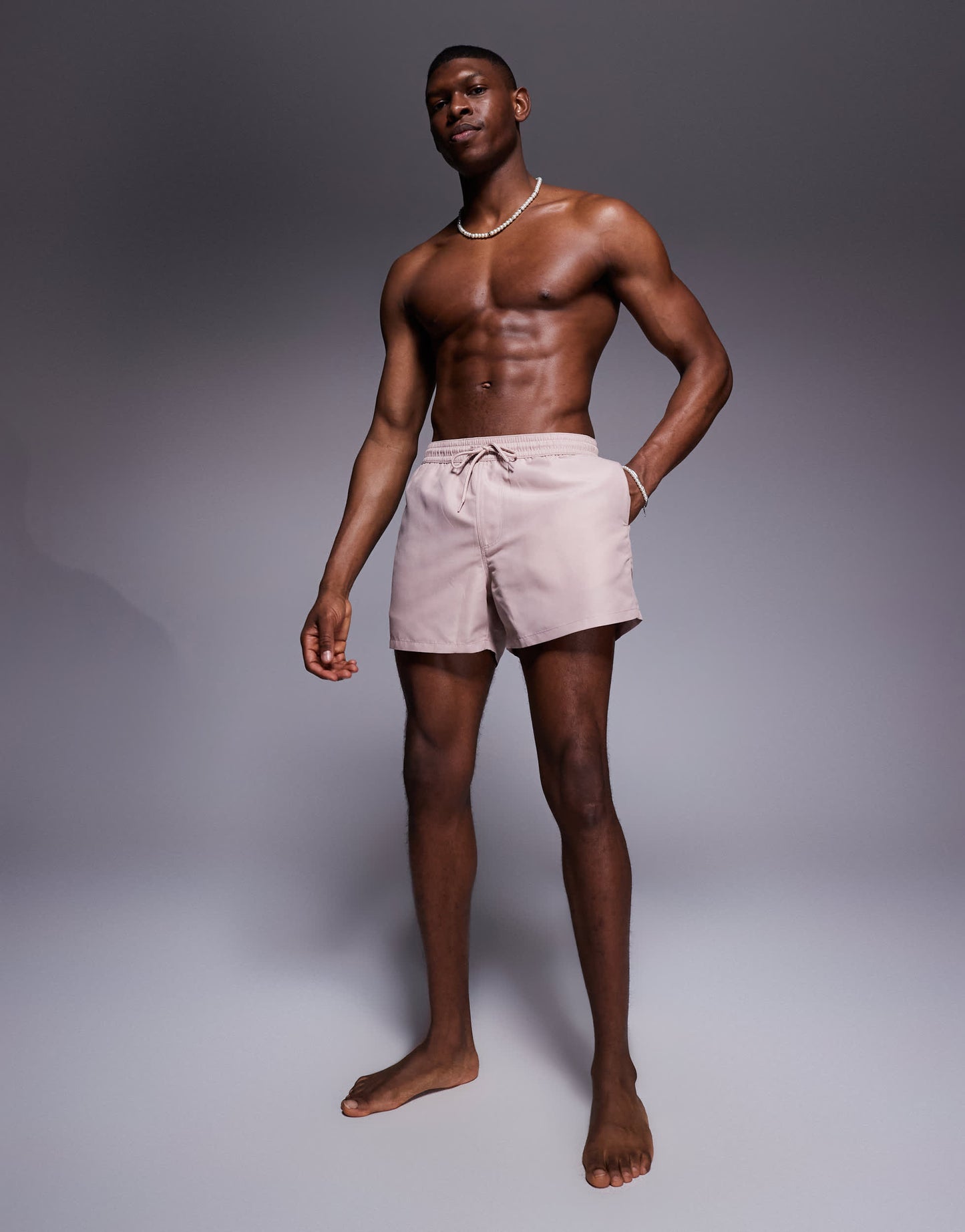 ASOS DESIGN swim shorts in short length in light brown
