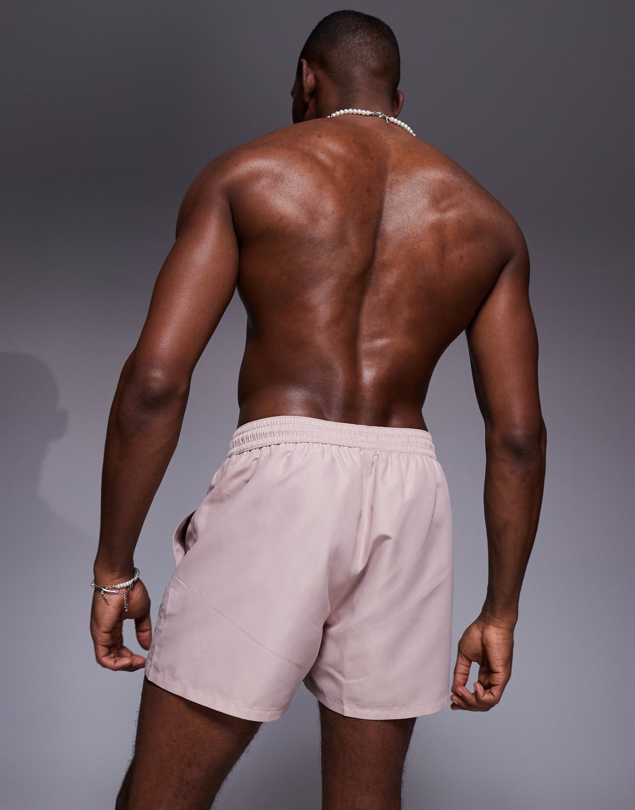 ASOS DESIGN swim shorts in short length in light brown