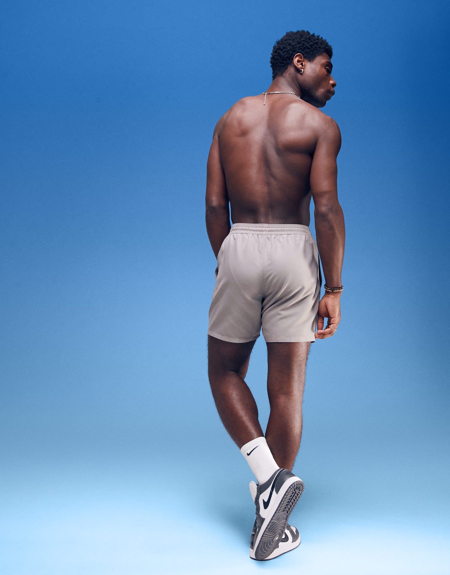 ASOS DESIGN swim shorts in mid length in grey