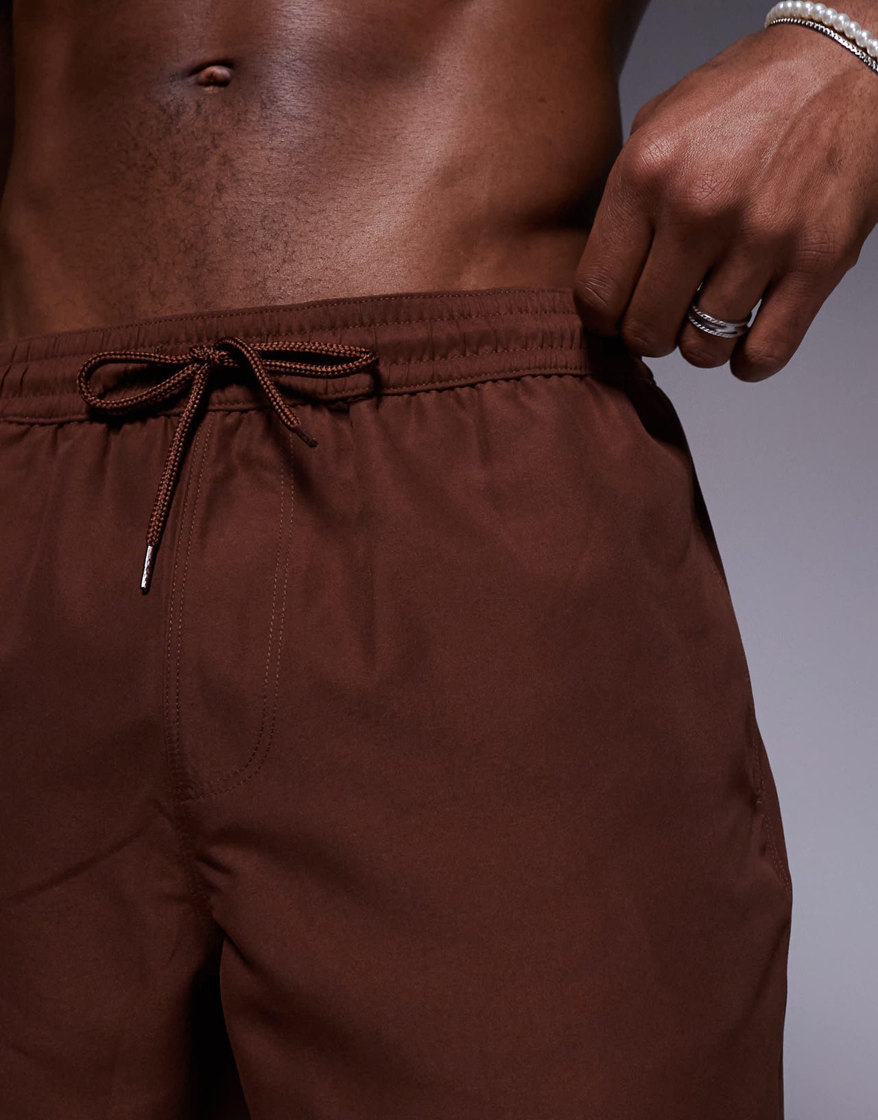 ASOS DESIGN swim shorts in mid length in dark brown