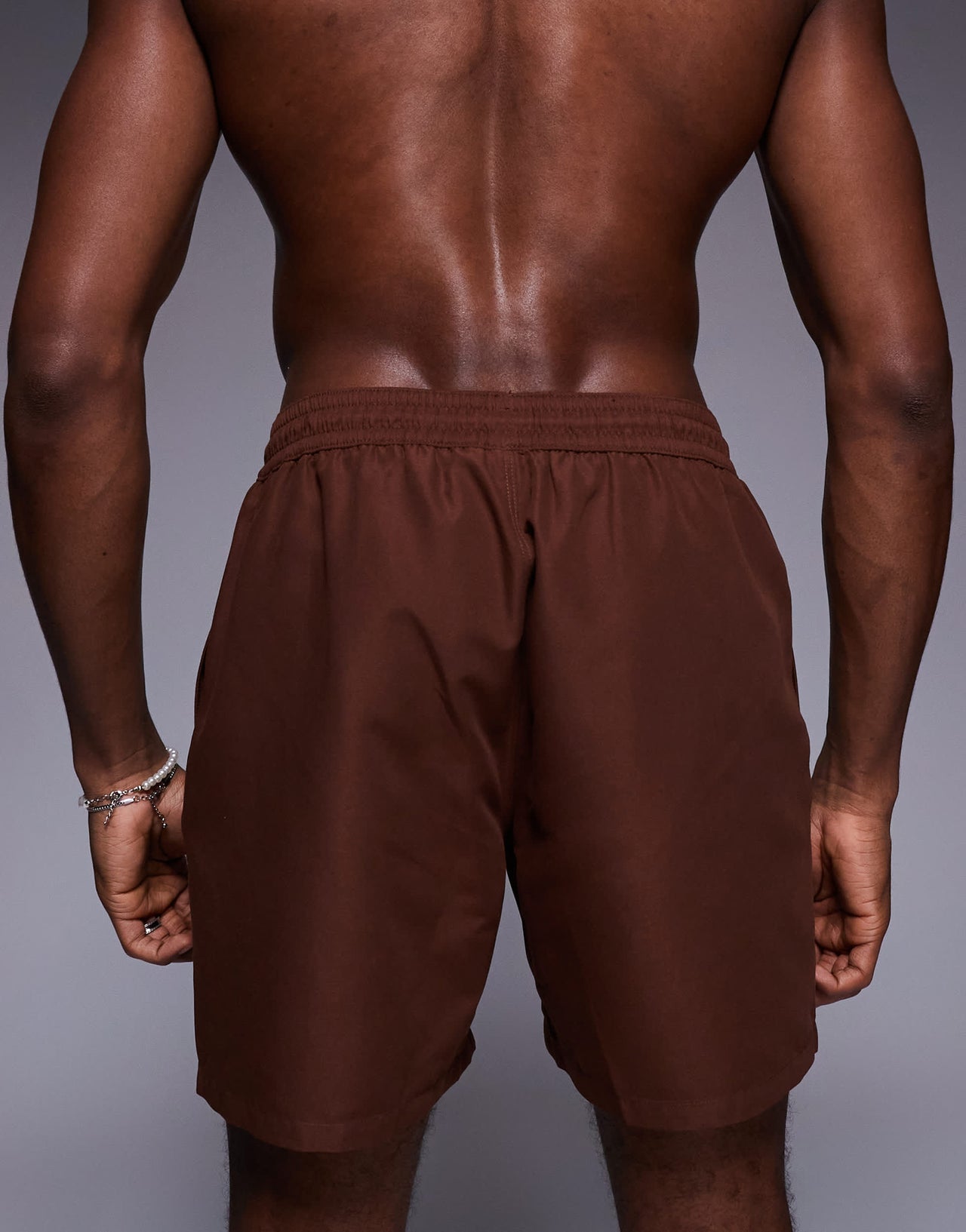 ASOS DESIGN swim shorts in mid length in dark brown