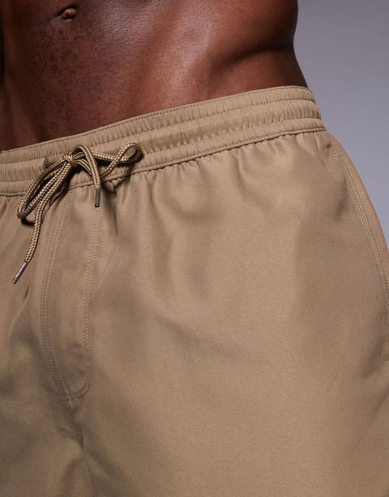 ASOS DESIGN swim shorts in mid length in dark stone