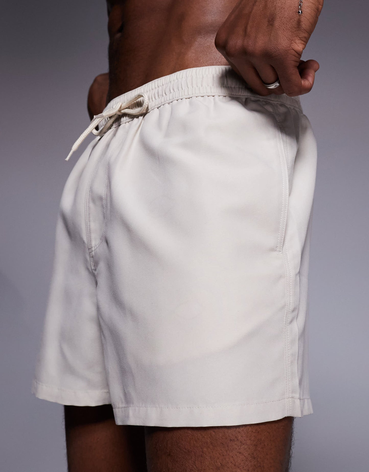 ASOS DESIGN swim shorts in short length in light stone